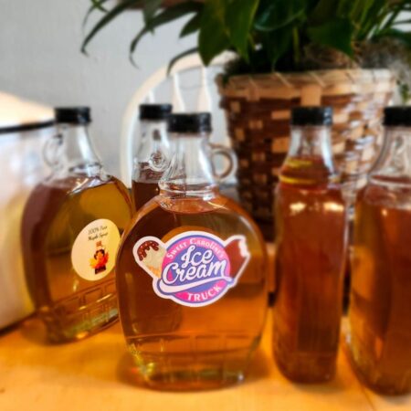 maple syrup jars with sweet carolines ice cream truck label